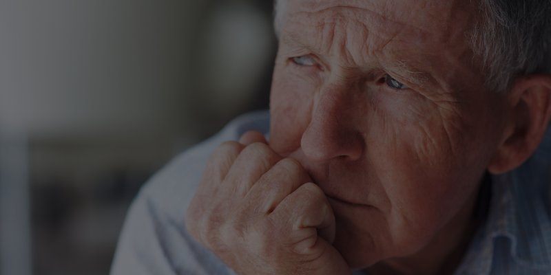 Older man looking into the distance