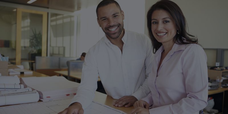 Couple smiling at table